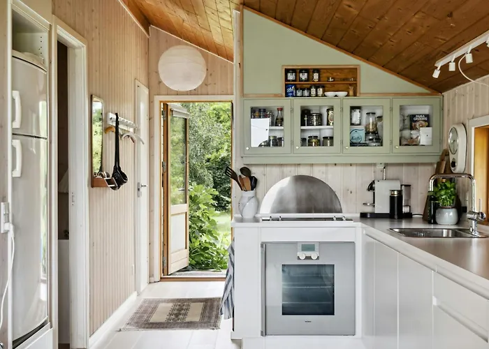 House By Forest And Roskilde Fjord's Waves